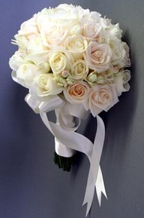 Bridal bouquet of roses and freesias