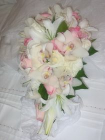 Bridal bouquet of roses and orchids